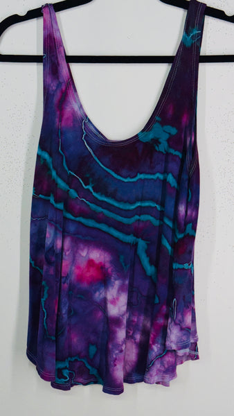 XL in the flow tank top (could fit 1xl too)