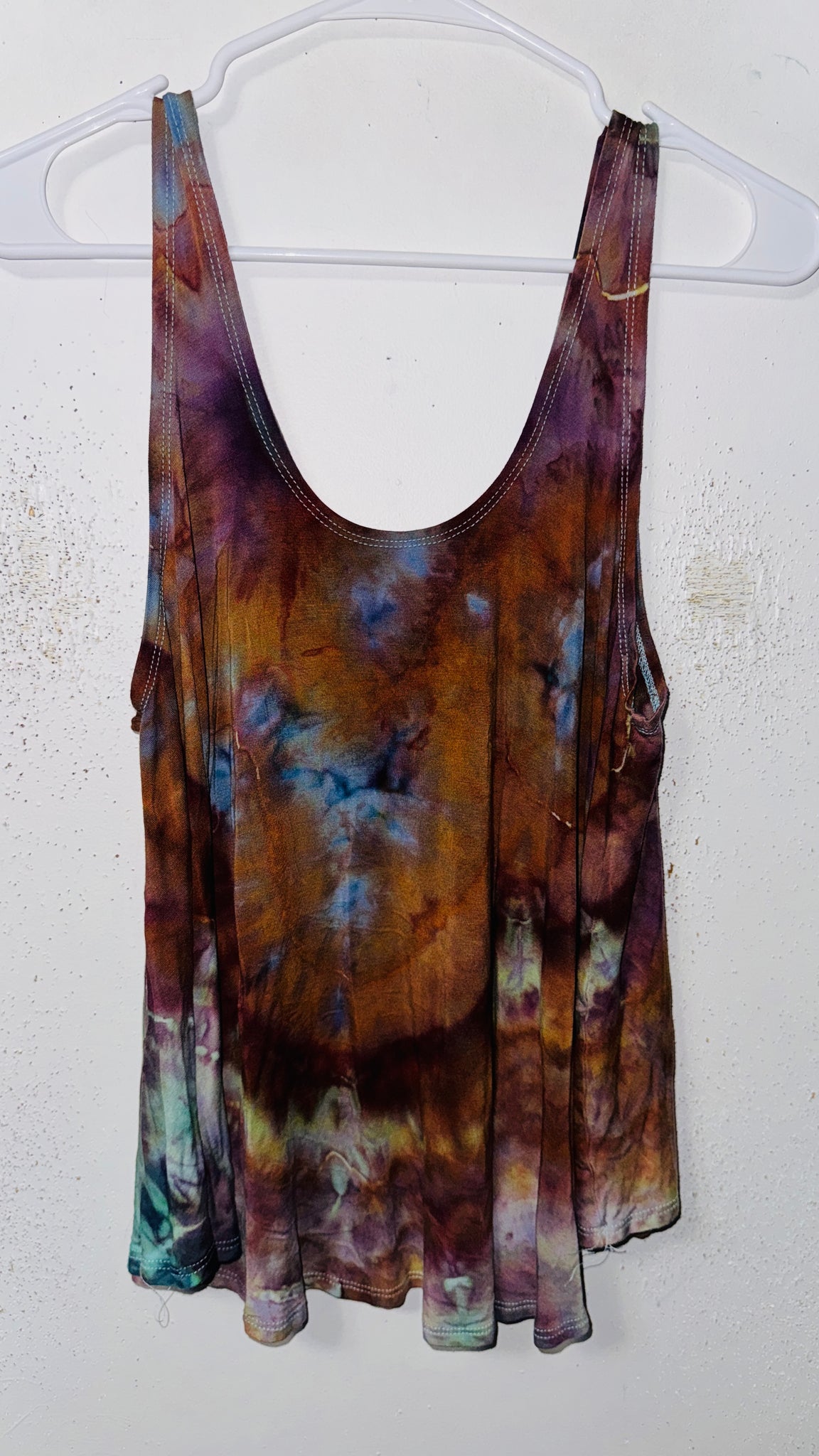 XL in the flow tank top (could fit 1xl too)