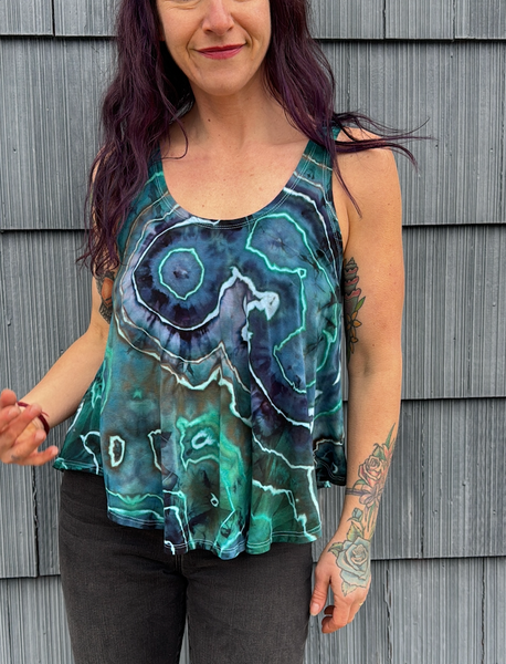 Small in the flow tank top (could fit medium too)
